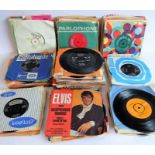A large assortment of sleeved 45 rpm records to include Elvis Presley (Always on my Mind; Suspicious