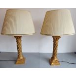 A pair of large and heavy table lamps and shades by the Original Lighting Company Ltd, the gilded