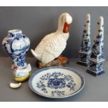 Five pieces comprising an East India Company armorial plate, an 18th-century-style Delft pottery