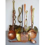 A good selection of mostly 19th century brass and copper skimmers and other associated wares (9)