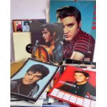 A large quantity of Elvis Presley calendars from the late 1990s through to the 2000s