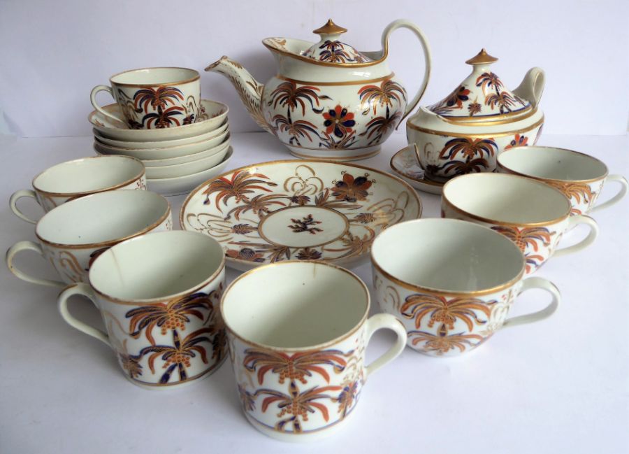 An early 19th century English porcelain part tea/coffee service; comprising teapot and cover, lidded