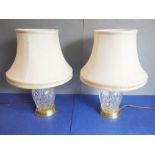 A pair of heavy Waterford Crystal ovoid table lamps (49cm high including shades)