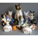 Sixteen ceramic cat models to include three blue-and-white Rye Pottery examples, one by Beswick and