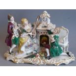 A mid-20th century hand-decorated Frankenthal (Dresden Art) porcelain figure group: a lady playing