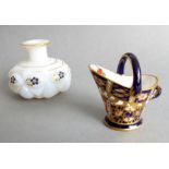 A Royal Crown Derby porcelain pail and a 19th century opaline glass scent. The model pail hand-
