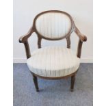 A late 19th / early 20th century upholstered oak open-armed fauteuil; in French style, blue and