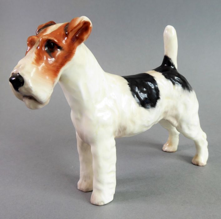 Six hand-decorated Royal Doulton porcelain dogs: Pekinese, Irish Setter, Jack Rusell with ball ( - Image 5 of 21