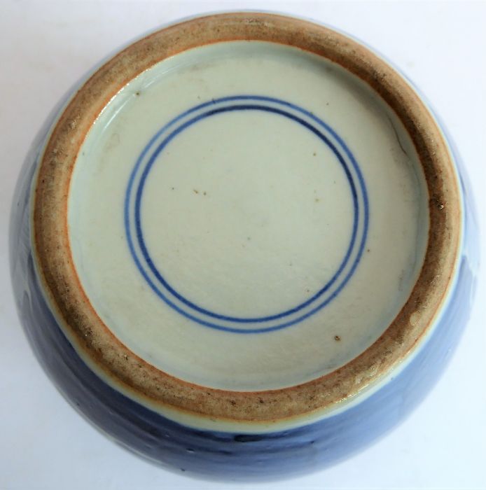 A Chinese porcelain bowl-and-cover and two blue-and-white jars: the large and heavy bowl hand- - Image 9 of 11