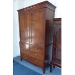 A good early 19th century George III period mahogany linen press; the outset cornice above two