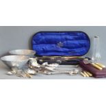 A selection to include a late 19th century bone-handled five-piece carving set by Mappin & Webb, a