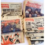 An assortment of musical newspapers to include Melody Maker (1963) detailing The Beatles, Sinatra,