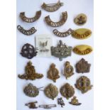 10 Cap Badges, 3 pairs of shoulder titles and 3 sweetheart-type badges. Cap badges: Hodson’s