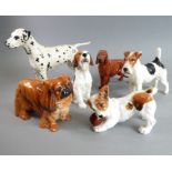 Six hand-decorated Royal Doulton porcelain dogs: Pekinese, Irish Setter, Jack Rusell with ball (