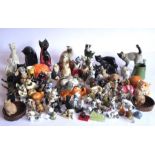 A large and interesting selection of mostly ceramic cats to include fine quality hand-painted