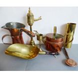 A selection of brass, copper and metalware to include a copper measure and scoop, a copper-and-brass