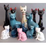 An interesting selection of thirteen ceramic cats to include 1950s examples, Rye Pottery and blue-