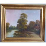 COLIN MAXWELL PARSONS - a signed oil on canvas river and woodland scene with a small cottage, gilt-