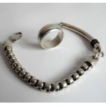 A heavy silver chain link wrist chain (fully hallmarked), together with a large silver wedding-style
