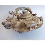 A large and unusual heavily patinated and verdigrised Chinese brass/bronze kettle; of squat circular