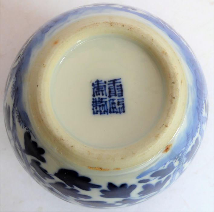 A Chinese porcelain bowl-and-cover and two blue-and-white jars: the large and heavy bowl hand- - Image 11 of 11