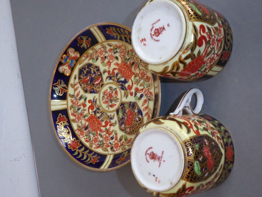 A set of four early 20th century Royal Crown Derby porcelain coffee cans and saucers; each finely - Image 6 of 6