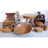 A good selection of various treen to include handcrafted bowls, a tripod stool, a carved duck,