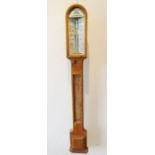A late 19th century oak-cased Admiral Fitzroy's Storm Barometer for restoration In the Auctioneer'