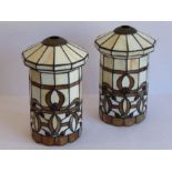 A pair of Tiffany- style glass light shades of dodecagon form; cream opaque and light-coffee-