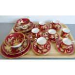 A Wedgwood fine bone china part tea and coffee set: seven coffee cans and (nine) saucers, two cups