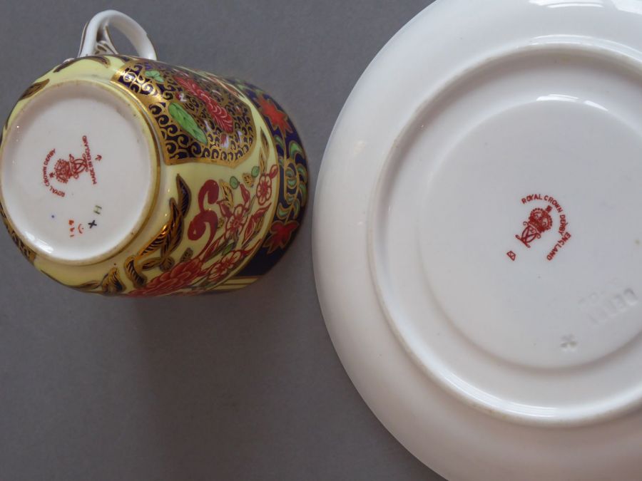 A set of four early 20th century Royal Crown Derby porcelain coffee cans and saucers; each finely - Image 2 of 6