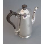A hallmarked silver coffee pot engraved with armorial, London assay marks, marks for the Goldsmith &