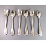 A set of six silver pastry forks