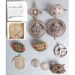 Eight silver and four base-metal, mostly wartime patriotic badges, pendants and coins. The silver