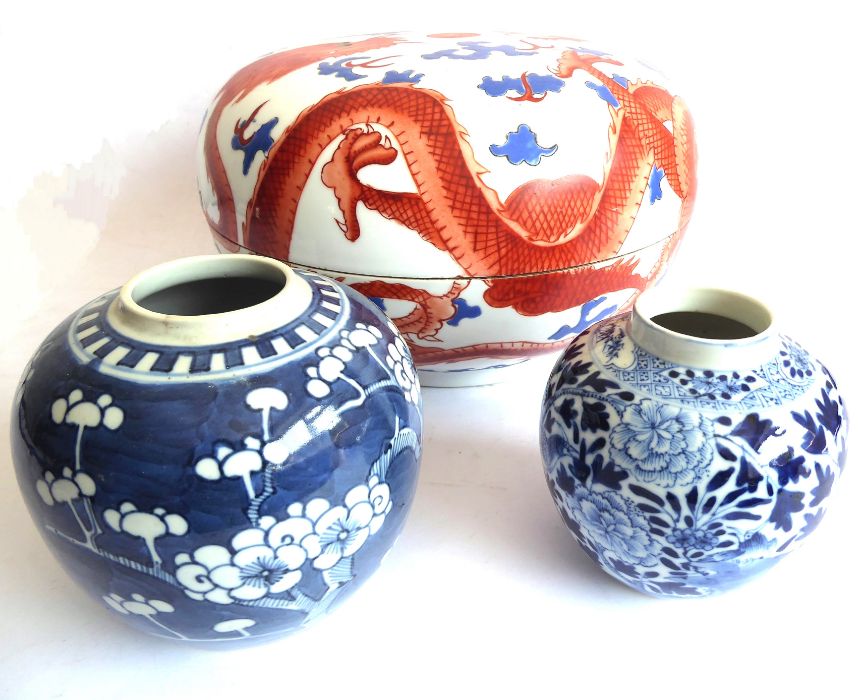 A Chinese porcelain bowl-and-cover and two blue-and-white jars: the large and heavy bowl hand-