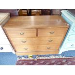 A walnut faced chest; the thumbnail-moulded top above two half-width and two full-width graduated