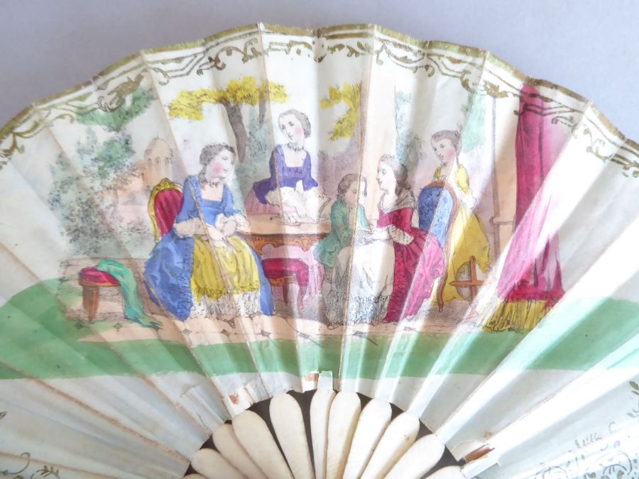 An early 20th century pierced wooden fan decorated with various Swiss costume, together with a - Image 2 of 10