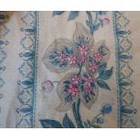 A pair of striped floral curtains in teal and pink with sewn-on decorative pelmet edged in teal,