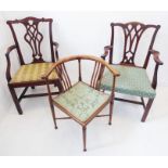 A 19th century mahogany open armchair in mid-18th century style; the central splat pierced with