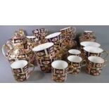 Royal Crown Derby tea and coffee wares; hand gilded and decorated in the Imari palette and
