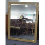 A large faux granite-framed wall-hanging looking glass with hand-bevelled plate (frame size 101cm