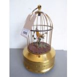 A modern West German singing bird automaton; gilt-metal base and with suspension ring (23cm high)