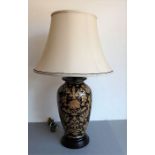 A fine and large Frederick Cooper (Chicago) table lamp in the 'noir tapestries' design; black ground
