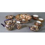 Mostly miniature Royal Crown Derby porcelain wares, hand gilded and decorated in the Imari