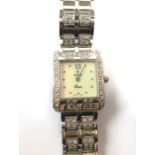A lady's diamond-set wrist watch by Vicence, the rectangular bezel set with brilliant cut diamonds