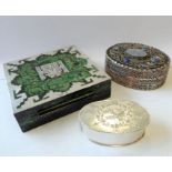 Three pieces comprising an ornate square box, green enamel on copper with inlaid .925 silver in