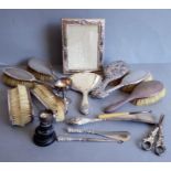 Various handheld silver-backed lady's hair and clothes brushes, together with silver-handled shoe