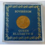 A plastic-cased HM Queen Elizabeth II 1980 sovereign