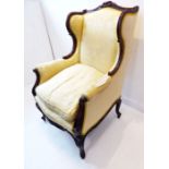 A good late 19th century French-style carved mahogany show wood and yellow-damask-upholstered