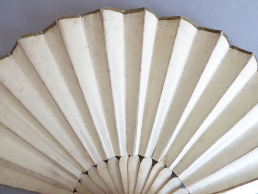 An early 20th century pierced wooden fan decorated with various Swiss costume, together with a - Image 3 of 10
